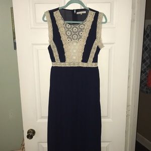 Navy and white maxi dress with sheer top and back.